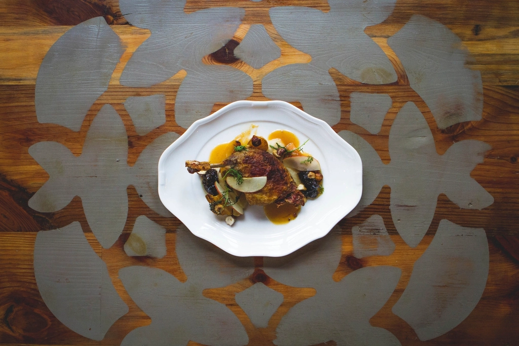 Three-course Italian dinner plated at a restaurant table